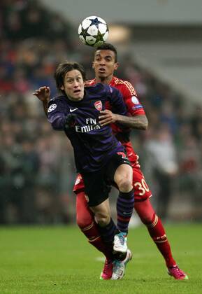 Tomas Rosicky, Luiz Gustavo Aktion Spielszene Zweikampf Fußball Fussball Championsleague Achtelfinale Rückspiel Saison 2012 13 13.03.2013 FC Bayern München vs. FC Arsenal London