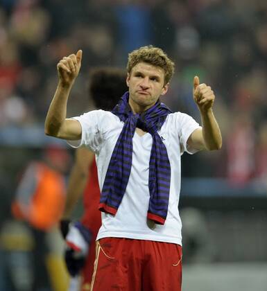 13.03.2013, Fussball Champions League Achtelfinale Rückspiel: FC Bayern München - FC Arsenal London, In der Allianz-Arena München. Thomas Müller (Bayern München) ist nach dem Spiel zufrieden.