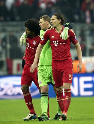 DANTE Bonfim, Manuel NEUER, Torwart, und Daniel VAN BUYTEN, alle Bayern,v (von links), nach Spielende. Fussball, Championsleague, Saison 2012 2013, Achtelfinale, FC Bayern München (München) - FC Arsenal London, am 13.03.2013 in München A L L I A N Z A R E N A Deutschland. Â