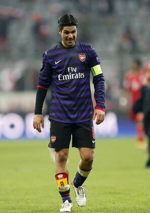 Arsenal s Mikel Arteta looks on dejected at the final whistle..Bayern Munich v Arsenal- UEFA Champions League - Second Round, Second Leg - Allianz Arena, Munich- 13 03 13 - Picture David Klein Sportimage EDITORIAL USE ONLY. No use with unauthorised audio, video, data, fixture lists, club league logos or live services. Online in-match use limited to 120 images, no video emulation. No use in betting, games or single club league player publications.