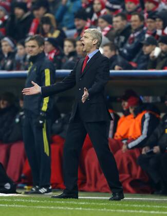 Arsenal s Arsene Wenger looks on ..Bayern Munich v Arsenal- UEFA Champions League - Second Round, Second Leg - Allianz Arena, Munich- 13 03 13 - Picture David Klein Sportimage EDITORIAL USE ONLY. No use with unauthorised audio, video, data, fixture lists, club league logos or live services. Online in-match use limited to 120 images, no video emulation. No use in betting, games or single club league player publications.