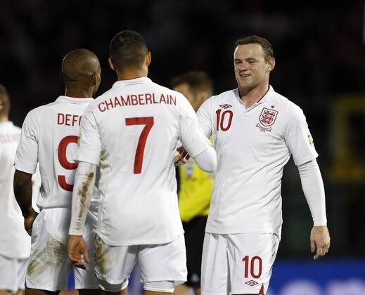 England s Wayne Rooney celebrates scoring his sides sixth goal..San Marino v England- World Cup Qualifier - Stadio di Serravalle, Serravalle- 22 03 13 - Picture David Klein Sportimage EDITORIAL USE ONLY. No use with unauthorised audio, video, data, fixture lists, club league logos or live services. Online in-match use limited to 120 images, no video emulation. No use in betting, games or single club league player publications.