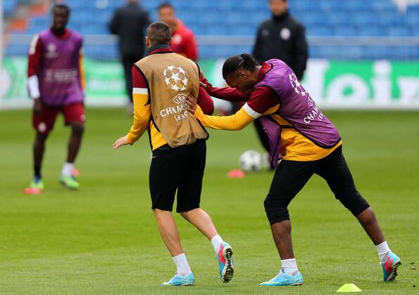 Galatasaray was having the last training before the Real Madrid match that they will play tomorrow in Madrid, Spain. 02.04.2013 Pictured: Burak Yilmaz (L) and Didier Drogba (R) 