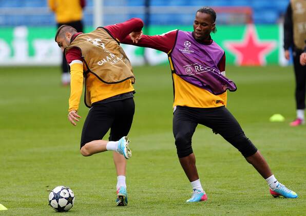 Galatasaray was having the last training before the Real Madrid match that they will play tomorrow in Madrid, Spain. 02.04.2013 Pictured: Burak Yilmaz (L) and Didier Drogba (R) 