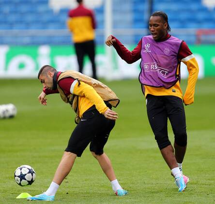 Galatasaray was having the last training before the Real Madrid match that they will play tomorrow in Madrid, Spain. 02.04.2013 Pictured: Burak Yilmaz (L) and Didier Drogba (R) 