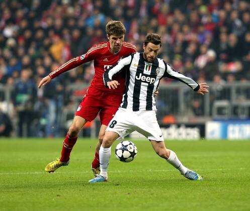 München Fußball Champions League Viertelfinale FC Bayern München vs. Juventus Turin, v.l. Thomas Müller (Bayern), Claudio Marchisio (Juve)