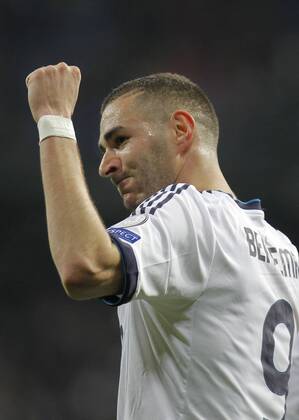 Soccer match between Real Madrid and Galatasaray corresponding to round of 4th first leg of the Champions League, held at the Santiago Bernabeu stadium, in Madrid 4 3 2013. Karim Benzema celebrate after scoring 