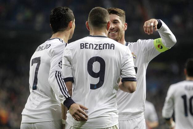 Real Madrid s Karim Benzema celebrates with Cristiano Ronaldo and Sergio Ramos during UEFA Champions League match. April 03, 2013.  (1581020)