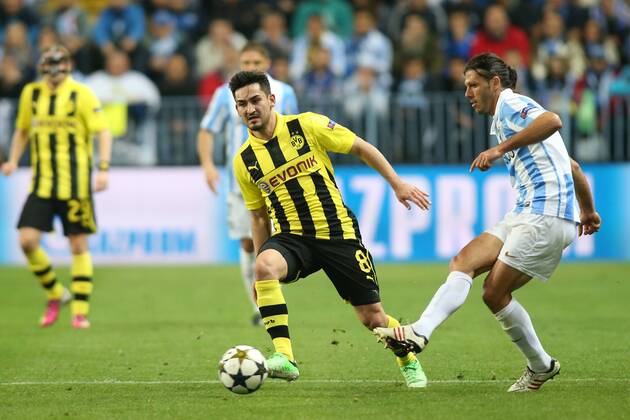 MALAGA CF - BORUSSIA DORTMUND --- UEFA CHAMPIONS LEAGUE QUARTERFINAL FIRST MATCH: MALAGA CF - BVB 1909 ILKAY GUNDOGAN MARTIN DEMICHELIS FOT. PIOTR KUCZA NEWSPIX.PL --- Newspix.pl  GY5Q5838