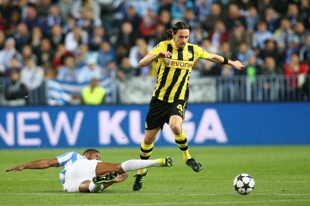MALAGA CF - BORUSSIA DORTMUND --- UEFA CHAMPIONS LEAGUE QUARTERFINAL FIRST MATCH: MALAGA CF - BVB 1909 JULIO BAPTISTA NEVEN SUBOTIC FOT. PIOTR KUCZA NEWSPIX.PL --- Newspix.pl  GY5Q5845
