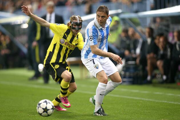 MALAGA CF - BORUSSIA DORTMUND --- UEFA CHAMPIONS LEAGUE QUARTERFINAL FIRST MATCH: MALAGA CF - BVB 1909 MARCEL SCHMELZER JOAQUIN FOT. PIOTR KUCZA NEWSPIX.PL --- Newspix.pl  GY5Q5923
