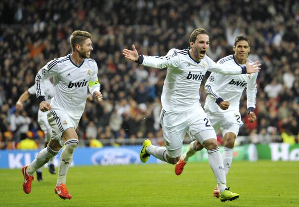 Gonzalo Higuain, striker of Real Madrid and Argentina , celebrating his goal ( 3-0 ) with Sergio Ramos and Raphael Varane- Real Madrid - Galatasaray - UEFA Champions League 2012 2013 - Quarters Finals- First Leg Match- 03 04 2013 - xFrancescaxCeciarini NJF Media 