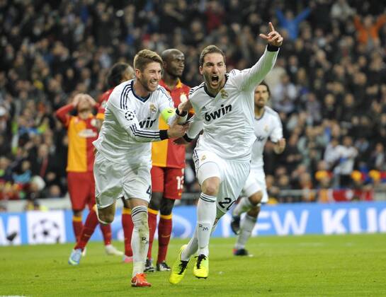 Gonzalo Higuain, striker of Real Madrid and Argentina , celebrating his goal ( 3-0 ) with Sergio Ramos - Real Madrid - Galatasaray - UEFA Champions League 2012 2013 - Quarters Finals- First Leg Match- 03 04 2013 - xFrancescaxCeciarini NJF Media 
