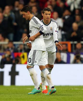 UEFA Champions League Quarter Final first leg match between Real Madrid and Galatasaray at Estadio Santiago Bernabeu on April 3, 2013 in Madrid, Spain. Match Scored: Real Madrid 3 - Galatasaray 0 Pictured: Mesut Ozil and Cristiano Ronaldo of Real Madrid. 