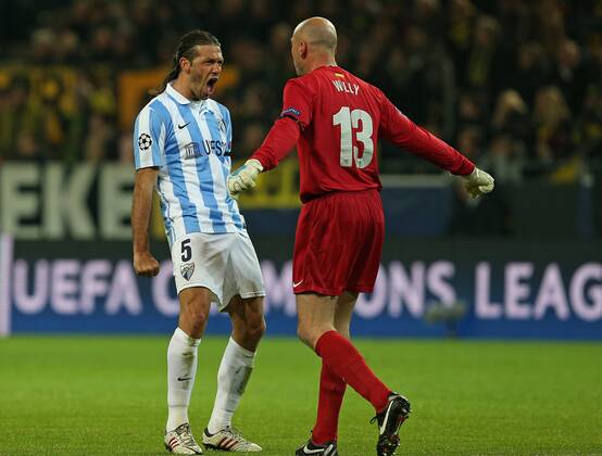 09.04.2013, Fussball Champions League Viertelfinale Rückspiel: Borussia Dortmund - FC Malaga, im Signal-Iduna-Park-Stadion Dortmund. Jubel Malaga zum Tor zum 0:1 v.l. Martin Demichelis (FC Malaga) und Torwart Willy Caballero (FC Malaga)