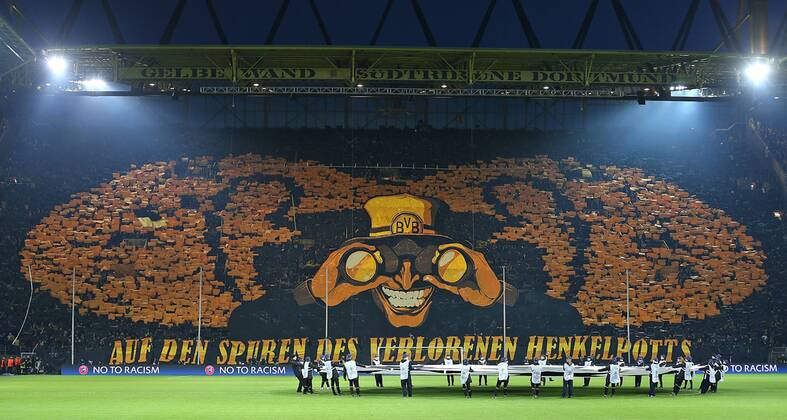 09.04.2013, Fussball Champions League Viertelfinale Rückspiel: Borussia Dortmund, im Signal-Iduna-Park-Stadion Dortmund. Auf den Spuren des verlorenen Henkelpotts steht auf der Choreografie von den BVB-Fans.