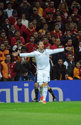 ISTANBUL, April 09, 2013 - Real Madrid s Cristiano Ronaldo celebrates after scoring during the UEFA Champions League quarter final second leg soccer match between Galatasaray and Real Madrid in Istanbul, Turkey, April 9, 2013. Real Madrid lost 2-3 but entered the semifinal with a total result 5-3.(Xinhua Ma Yan) TURKEY-ISTANBUL-SOCCER-UEFA 