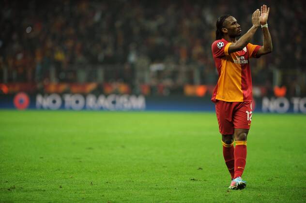 ISTANBUL, April 09, 2013 - Galatasaray s Didier Drogba gestures to the audience during the UEFA Champions League quarter final second leg soccer match between Galatasaray and Real Madrid in Istanbul, Turkey, April 9, 2013. Real Madrid lost 2-3 but entered the semifinal with a total result 5-3.(Xinhua Ma Yan) TURKEY-ISTANBUL-SOCCER-UEFA 