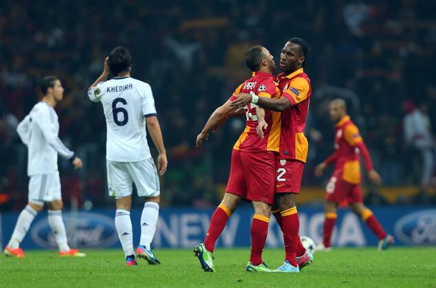 UEFA Champions League Quarter Final second leg match between Galatasaray and Real Madrid at Turk Telekom Arena Stadium on April 9, 2013 in Istanbul, Turkey. Match Scored: Galatasaray 3 - Real Madrid 2 Pictured: Nordin Amrabat and Didier Drogba of Galatasaray. 
