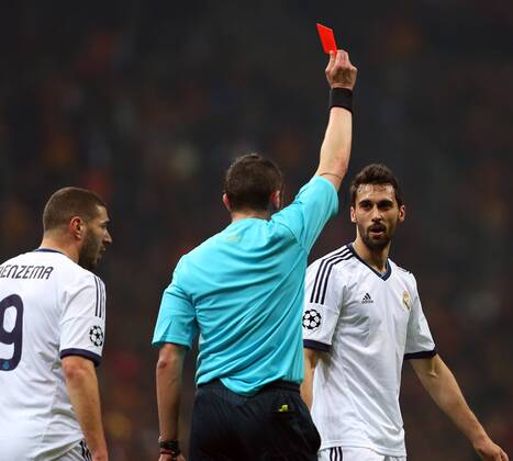 UEFA Champions League Quarter Final second leg match between Galatasaray and Real Madrid at Turk Telekom Arena Stadium on April 9, 2013 in Istanbul, Turkey. Match Scored: Galatasaray 3 - Real Madrid 2 Pictured: Alvaro Arbeloa of Real Madrid and Referee Stephane Lannoy 