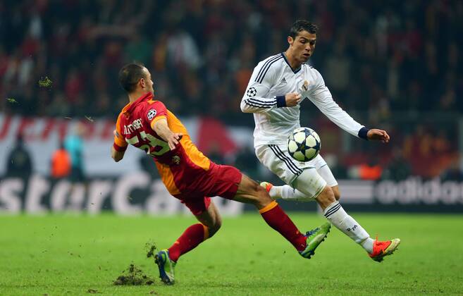 UEFA Champions League Quarter Final second leg match between Galatasaray and Real Madrid at Turk Telekom Arena Stadium on April 9, 2013 in Istanbul, Turkey. Match Scored: Galatasaray 3 - Real Madrid 2 Pictured: Cristiano Ronaldo of Real Madrid and Nordin Amrabat of Galatasaray. 