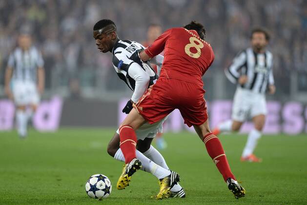 FUSSBALL CHAMPIONS LEAGUE VIERTELFINALE RÜCKSPIEL 2012 2013 Juventus Turin - FC Bayern München 10.04.2013 Paul Pogba (li, Juventus Turin) gegen Javi Martinez (re, FC Bayern München) 