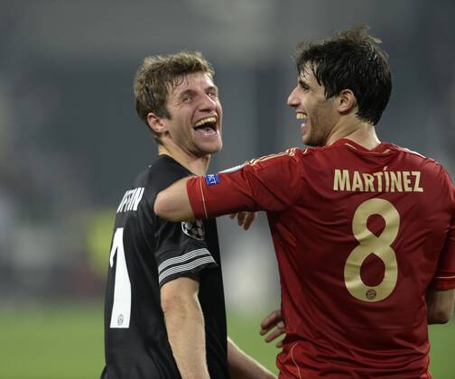10.04.2013, Fussball Champions League Viertelfinale Rückspiel: Juventus Turin - FC Bayern München, in der Juventus-Arena in Turin (Italien). v.li: Thomas Müller (Bayern München) und Javi Martinez (FC Bayern) nach dem Spiel Glücklich.