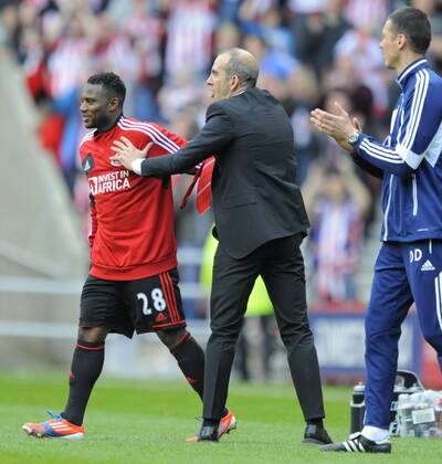 Sunderland manager Paolo Di Canio celebrates at the final whistle with goal scorer Stephane Sessegnon - Barclays Premier League - Sunderland vs Everton - Stadium of Light - Sunderland - 20 04 13 - Picture Richard Lee Sportimage EDITORIAL USE ONLY. No use with unauthorised audio, video, data, fixture lists, club league logos or live services. Online in-match use limited to 120 images, no video emulation. No use in betting, games or single club league player publications.