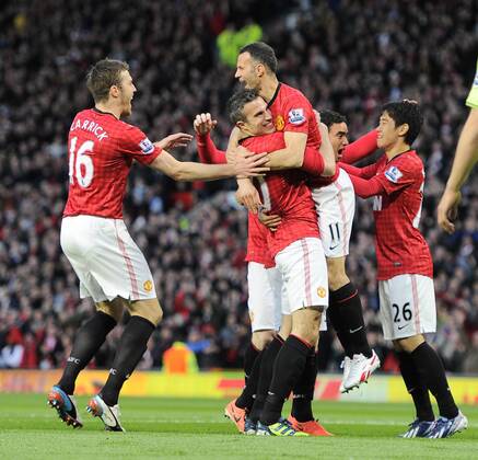 goalscorer Robin van Persie of Manchester United celebrates with the providor Ryan Giggs of Manchester United - Barclays Premier league - Manchester Utd ManU vs Aston Villa - Old Trafford Stadium - Manchester - 22 04 13 - EDITORIAL USE ONLY. No use with unauthorised audio, video, data, fixture lists, club league logos or live services. Online in-match use limited to 120 images, no video emulation. No use in betting, games or single club league player publications.