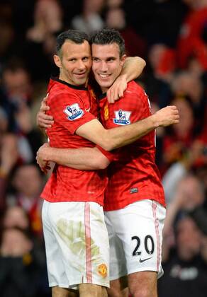 Hatrick goalscorer Robin van Persie of Manchester United celebrates with Ryan Giggs of Manchester United - Barclays Premier league - Manchester Utd ManU vs Aston Villa - Old Trafford Stadium - Manchester - 22 04 13 - EDITORIAL USE ONLY. No use with unauthorised audio, video, data, fixture lists, club league logos or live services. Online in-match use limited to 120 images, no video emulation. No use in betting, games or single club league player publications.