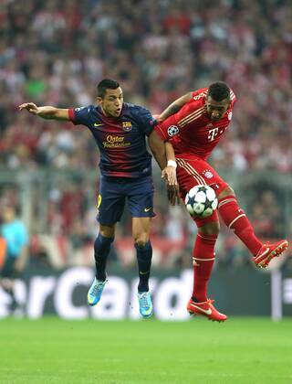 FUSSBALL - CL, Bayern vs Barcelona MUENCHEN,DEUTSCHLAND,23.APR.13 - FUSSBALL - UEFA Champions League, Halbfinale, FC Bayern München vs FC Barcelona. Bild zeigt Alexis Sanchez (Barcelona) und Jerome Boateng (Bayern). 