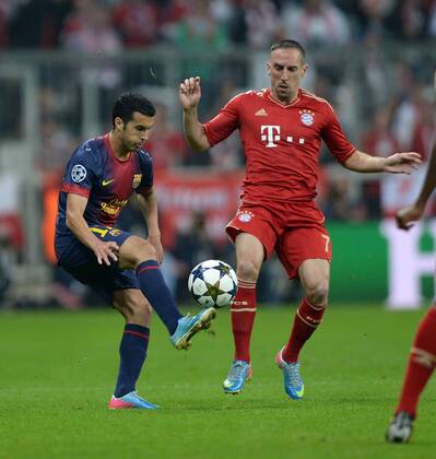 FUSSBALL CHAMPIONS LEAGUE HALBFINALE HINSPIEL 2012 2013 FC Bayern München - FC Barcelona 23.04.2013 Pedro Rodriguez (li, Barca) gegen Franck Ribery (re, FC Bayern München) 