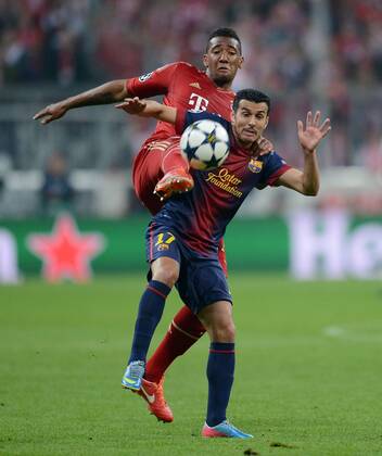 FUSSBALL CHAMPIONS LEAGUE HALBFINALE HINSPIEL 2012 2013 FC Bayern München - FC Barcelona 23.04.2013 Jerome Boateng (hinten, FC Bayern München) gegen Pedro Rodriguez (vorn, Barca) 