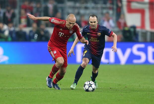 FUSSBALL - CL, Bayern vs Barcelona MUENCHEN,DEUTSCHLAND,23.APR.13 - FUSSBALL - UEFA Champions League, Halbfinale, FC Bayern München vs FC Barcelona. Bild zeigt Arjen Robben (Bayern) und Andres Iniesta (Barcelona). 