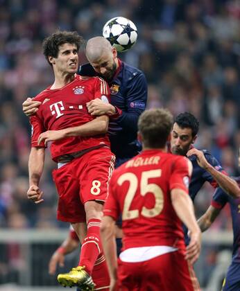 FUSSBALL - CL, Bayern vs Barcelona MUENCHEN,DEUTSCHLAND,23.APR.13 - FUSSBALL - UEFA Champions League, Halbfinale, FC Bayern München vs FC Barcelona. Bild zeigt Javi Martinez (Bayern) und Gerard Pique (Barcelona). 