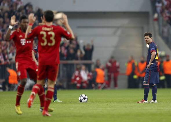 Munich s Mario Gomez celebrates scoring his sides second goal as Barcelona s Lionel Messi looks on dejected..Bayern Munich v Barcelona - Champions League, Semi Final 1st Leg- Allianz Arena, Munich- 23 04 13 - Picture David Klein Sportimage EDITORIAL USE ONLY. No use with unauthorised audio, video, data, fixture lists, club league logos or live services. Online in-match use limited to 120 images, no video emulation. No use in betting, games or single club league player publications.