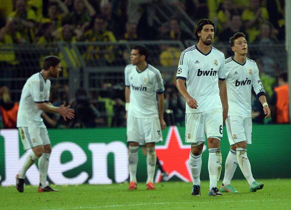 24.04.2013, xjhx,UEFA Champions League, Borussia Dortmund - Real Madrid, v.l. Xabi Alonso (Real Madrid), Pepe Keppler De Lima (Real Madrid), Sami Khedira (Real Madrid), Mesut Özil (Real Madrid) enttaeuscht, enttaeuscht schauend, dissapointed nachdem 1:3