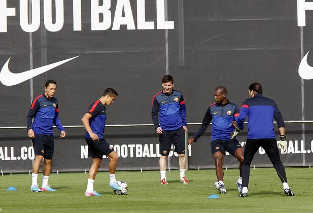 FC Barcelona session training: Lionel Messi, Eric Abidal 
