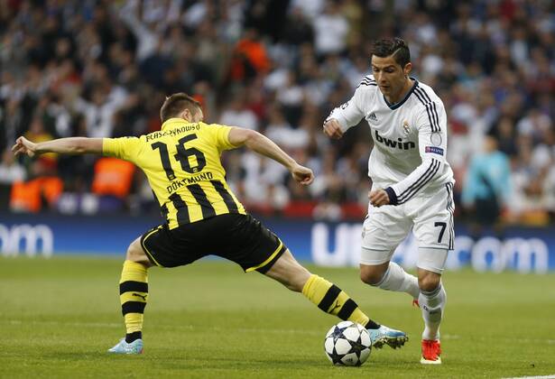 Cristiano Ronaldo, Jakub Blaszczykowski (Kuba) Soccer match between Real Madrid andBorussia Dortmund corresponding tosemifinal of the Champions League, held at the Santiago Bernabeu stadium, in Madrid 4 30 2013. 