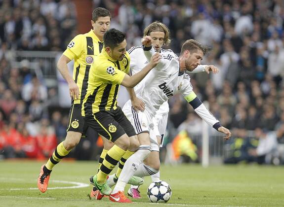 Real Madrid s Sergio Ramos against Borussia Dortmund s Ilkay Gündogan during UEFA Champions League match. April 30, 2013.  (1583358)