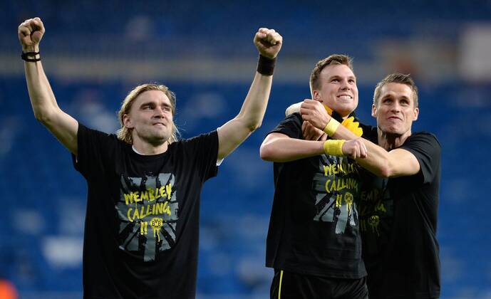 FUSSBALL CHAMPIONS LEAGUE HALBFINALE RÜCKSPIEL 2012 2013 Real Madrid - Borussia Dortmund 30.04.2013 Marcel Schmelzer, Kevin Großkreutz und Sebastian Kehl (v.l., alle Borussia Dortmund) jubeln nach dem Abpfiff 
