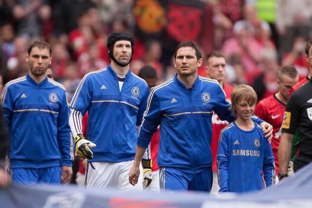 Football - 2012 2013 Premier League - Manchester United vs. Chelsea Frank Lampard of Chelsea leads out his side at Old Trafford