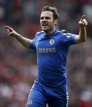 Juan Mata of Chelsea celebrates scoring the winning goal during the Barclays Premier League match between Manchester United and Chelsea at Old Trafford in Manchester, Britain on May 5, 2013. Chelsea won 1-0.(Xinhua Wang Lili) FOR EDITORIAL USE ONLY. NOT FOR SALE FOR MARKETING OR ADVERTISING CAMPAIGNS. NO USE WITH UNAUTHORIZED AUDIO, VIDEO, DATA, FIXTURE LISTS, CLUB LEAGUE LOGOS OR LIVE SERVICES. ONLINE IN-MATCH USE LIMITED TO 45 IMAGES, NO VIDEO EMULATION. NO USE IN BETTING, GAMES OR SINGLE CLUB LEAGUE PLAYER PUBLICATIONS. BRITAIN-MANCHESTER-SOCCER-PREMIER LEAGUE-MAN UTD VS CHELSEA