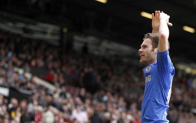 Juan Mata of Chelsea celebrates scoring the winning goal during the Barclays Premier League match between Manchester United and Chelsea at Old Trafford in Manchester, Britain on May 5, 2013. Chelsea won 1-0.(Xinhua Wang Lili) FOR EDITORIAL USE ONLY. NOT FOR SALE FOR MARKETING OR ADVERTISING CAMPAIGNS. NO USE WITH UNAUTHORIZED AUDIO, VIDEO, DATA, FIXTURE LISTS, CLUB LEAGUE LOGOS OR LIVE SERVICES. ONLINE IN-MATCH USE LIMITED TO 45 IMAGES, NO VIDEO EMULATION. NO USE IN BETTING, GAMES OR SINGLE CLUB LEAGUE PLAYER PUBLICATIONS. BRITAIN-MANCHESTER-SOCCER-PREMIER LEAGUE-MAN UTD VS CHELSEA