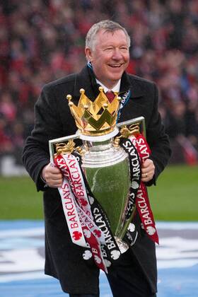 Football - Premier League 2012 2013 - Manchester United - Alex Ferguson, manager of Manchester United celebrates with the trophy at Old Trafford