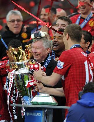 Sir Alex Ferguson manager of Manchester United with the Premeir League Trophy - Barclays Premier League - Manchester United ManU - Old Trafford Stadium - Manchester - England - 12 05 13 - EDITORIAL USE ONLY. No use with unauthorised audio, video, data, fixture lists, club league logos or live services. Online in-match use limited to 120 images, no video emulation. No use in betting, games or single club league player publications.