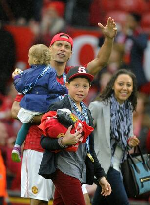 Rio Ferdinand of Manchester United with his family - Barclays Premier League - Manchester United ManU - Old Trafford Stadium - Manchester - England - 12 05 13 - EDITORIAL USE ONLY. No use with unauthorised audio, video, data, fixture lists, club league logos or live services. Online in-match use limited to 120 images, no video emulation. No use in betting, games or single club league player publications.