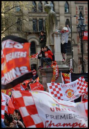 Manchester United Fans wait for Manchester United players to turn up in Albert Square, Manchester, Manchester United celebrate winning their 20th league title winning the Premier League, Monday May 13, 2013. AndrewxParsonsx xi-Images AJP