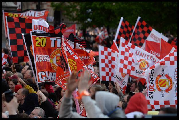 Manchester United Fans wait for Manchester United players to turn up in Albert Square, Manchester, Manchester United celebrate winning their 20th league title winning the Premier League, Monday May 13, 2013. AndrewxParsonsx xi-Images AJP