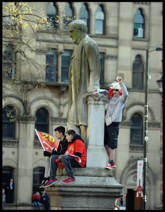 Manchester United Fans wait for Manchester United players to turn up in Albert Square, Manchester, Manchester United celebrate winning their 20th league title winning the Premier League, Monday May 13, 2013. AndrewxParsonsx xi-Images AJP